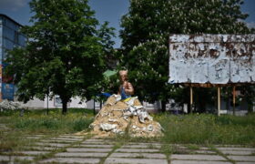 головна